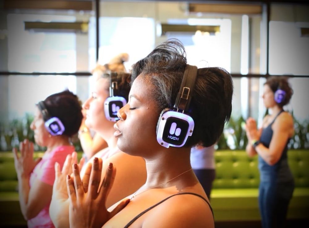 silent fitness class with headphones