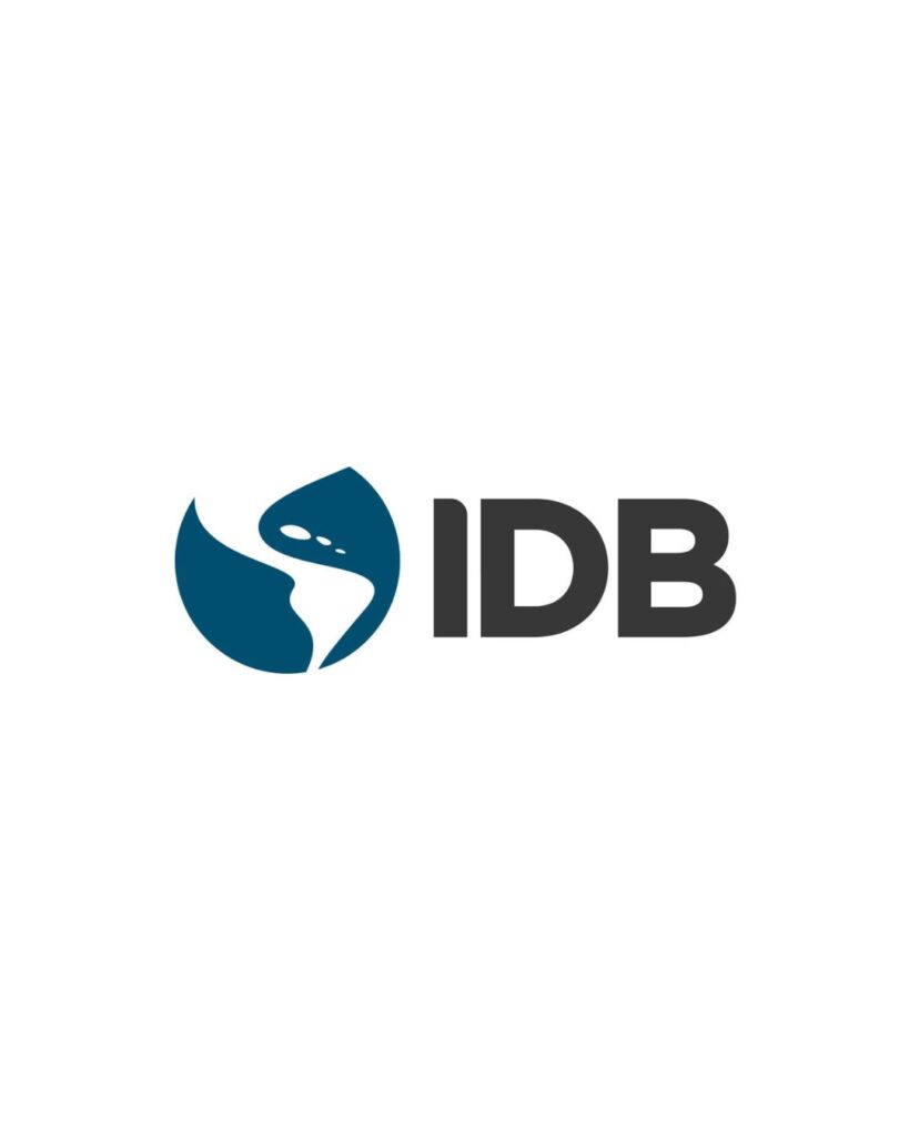 The IDB logo, displayed at a silent conference, features a stylized blue graphic of a hand holding a leaf, next to the bold black letters "IDB" on a white background.